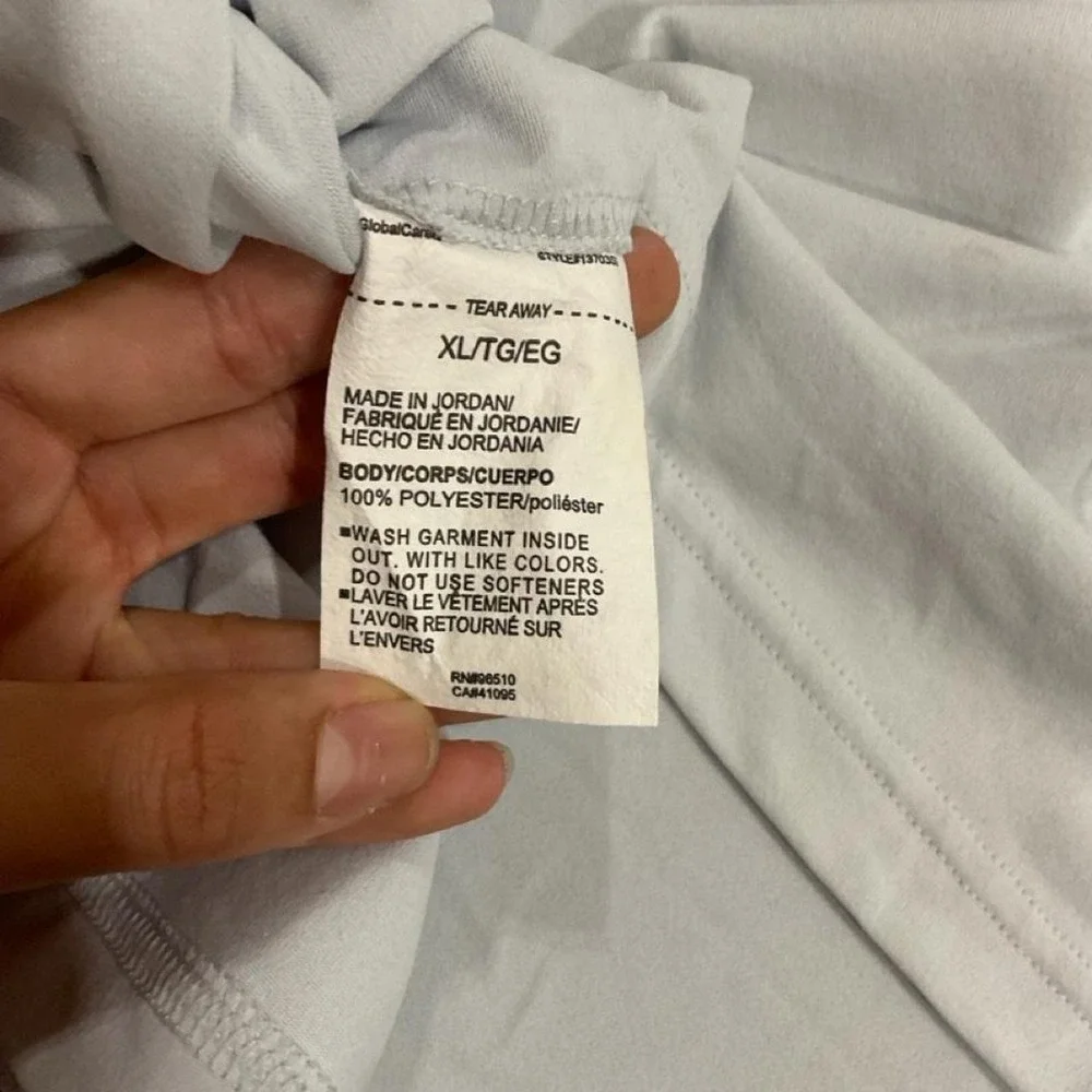 Under Armour white polo shirt